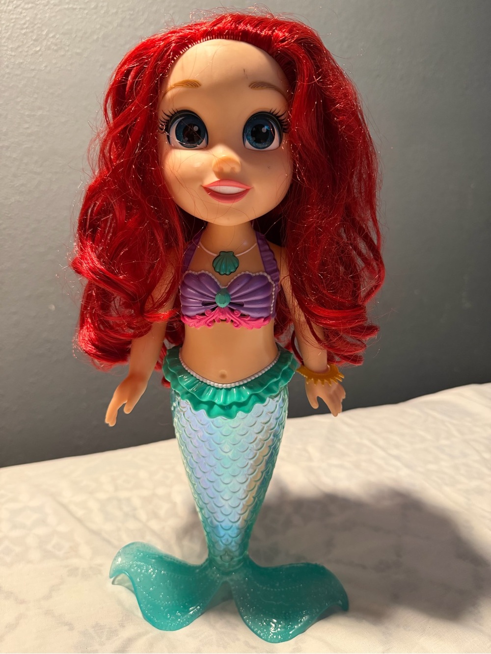 Disney Ariel sings and sparkle Mermaid Doll with Purple Top and Teal Tail 14’’